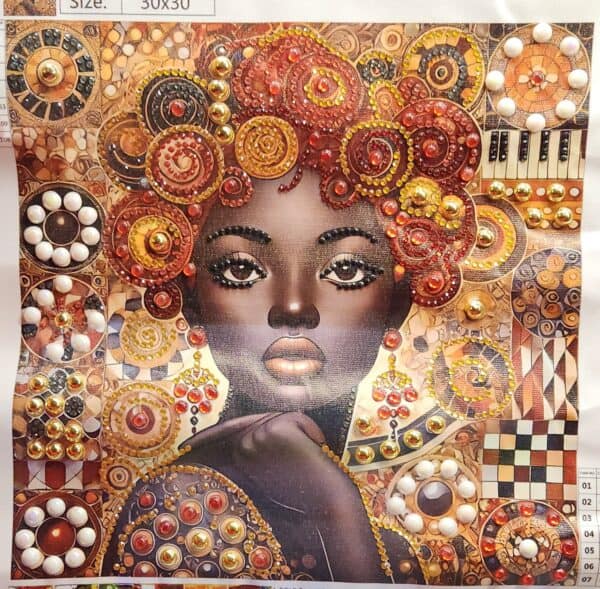 Artistic portrait of a Black woman with elaborate jewelry and vibrant headwrap.