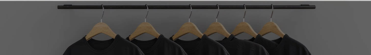 BlackSpace logo on black t-shirts hanging on a clothing rack for Black culture and fashion.