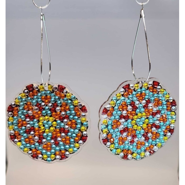 Bright beaded earrings with multicolored gemstones, showcasing vibrant African-inspired jewelry desi.