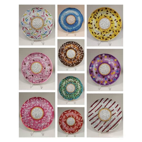 Colorful beaded mosaic art piece with circular design, showcasing vibrant patterns and textures.