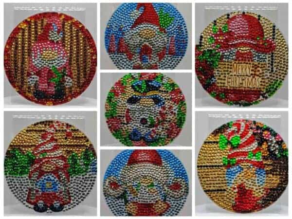 Santa Claus Christmas ornament decorated with colorful beads and festive designs.