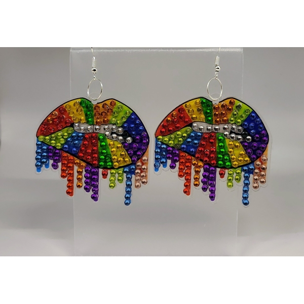 Bright rainbow-colored beaded earrings with rainbow and fringe design, celebrating Black culture and.