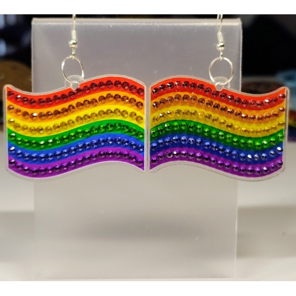 Bright rainbow flag earrings with colorful rhinestones representing LGBTQ+ pride and diversity.
