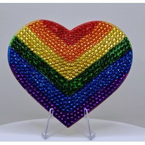 Rainbow heart decorated with colorful rhinestones representing LGBTQ+ pride and diversity.
