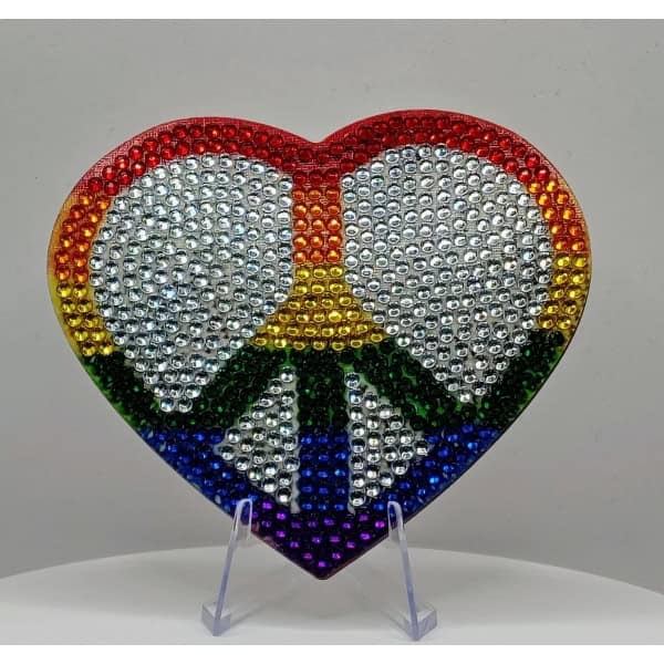 Rainbow heart peace sign made of rhinestones, symbolizing love and unity for Black Lives Matter and.