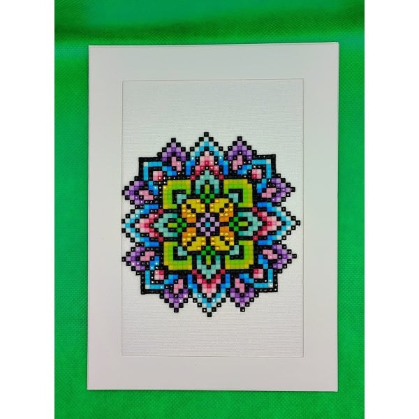 Vibrant pixel art mandala with bright colors on white canvas for BlackSpace community.