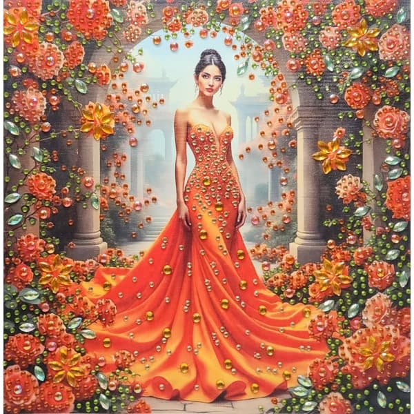 Elegant woman in an orange gown surrounded by vibrant flowers and lush greenery, showcasing fashion.